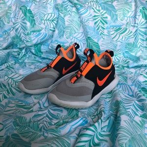 Boys NIKE gym shoes. Orange grey and black.